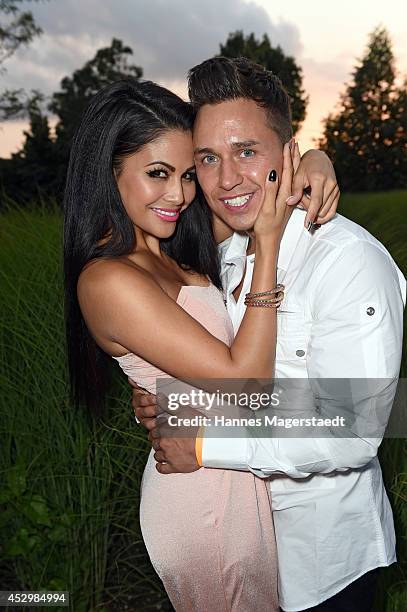 Playmate Mia Gray and her boyfriend Oliver Kobs attend the 'Citroen C4 Cactus' Munich Preview at Leonardo Royal Hotel on July 31, 2014 in Munich,...