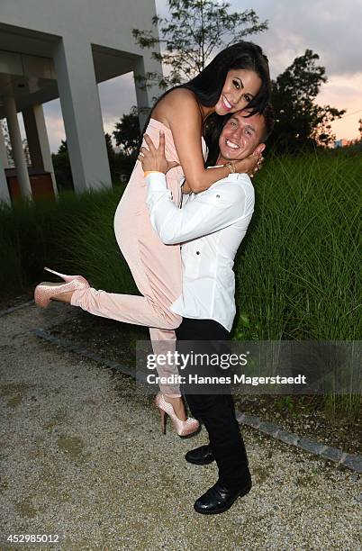 Playmate Mia Gray and her boyfriend Oliver Kobs attend the 'Citroen C4 Cactus' Munich Preview at Leonardo Royal Hotel on July 31, 2014 in Munich,...