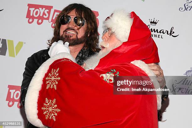 Singer/songwriter Billy Ray Cyrus and Santa Claus attend The Hollywood Christmas Parade Benefiting Toys For Tots Foundation on December 1, 2013 in...