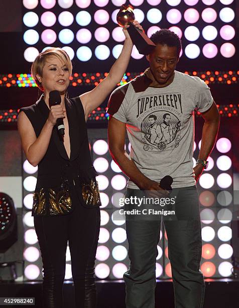 Actors Tina Majorino and Orlando Jones speak onstage at the MTVu Fandom Awards during Comic-Con International 2014 at PETCO Park on July 24, 2014 in...