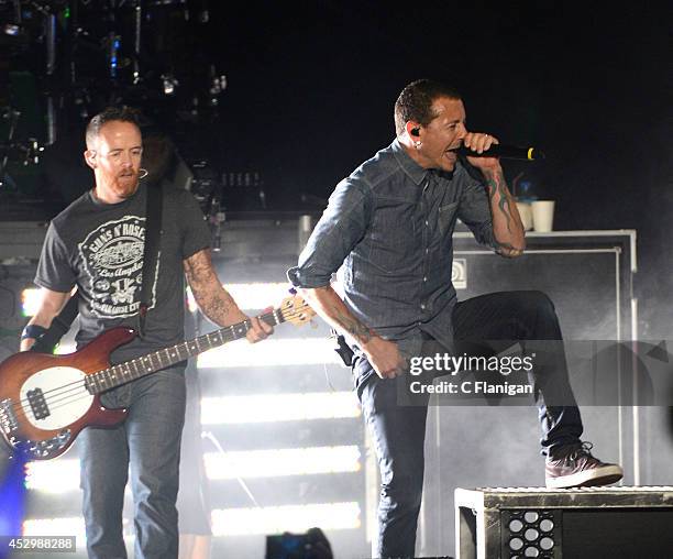 Recording artists Chester Bennington and Mike Shinoda of Linkin Park perform onstage at the MTVu Fandom Awards during Comic-Con International 2014 at...