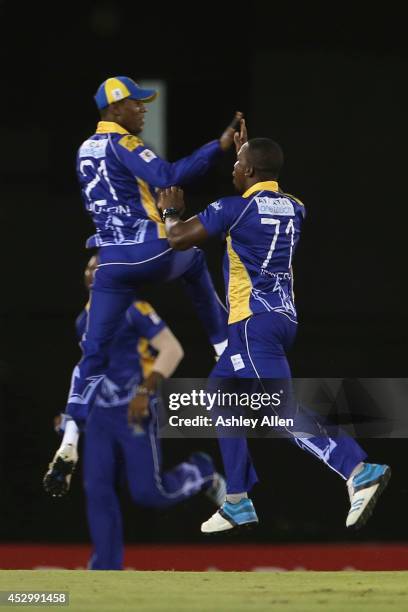 Kyle Mayers and Akeal Hosien celebrate during a match between St. Lucia Zouks and Barbados Tridents as part of week 4 of the Limacol Caribbean...