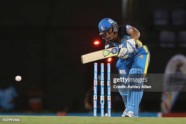 St Lucia Zouks openning batsman Henry Davids is clean bowled during a match between St. Lucia Zouks and Barbados Tridents as part of week 4 of the...