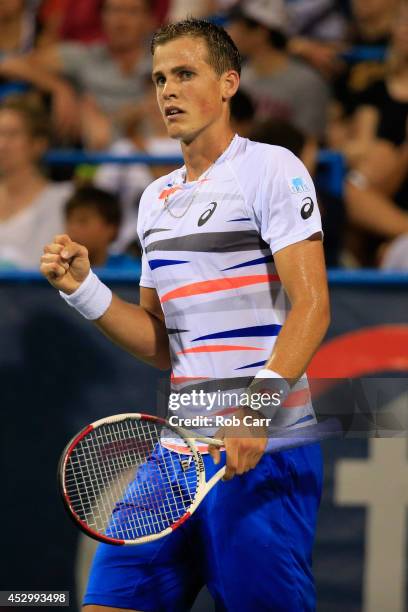 Vasek Pospisil of Canada celebrates after winning a point against Tomas Berdych of Czech Republic during the Citi Open at the William H.G. FitzGerald...