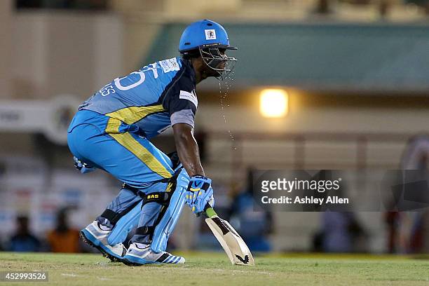 Sweat pours off Johnson Charles during a match between St. Lucia Zouks and Barbados Tridents as part of week 4 of the Limacol Caribbean Premier...