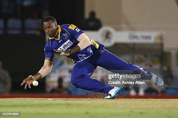 Tridents captain Kieron Pollard fields off his own bowling during a match between St. Lucia Zouks and Barbados Tridents as part of week 4 of the...