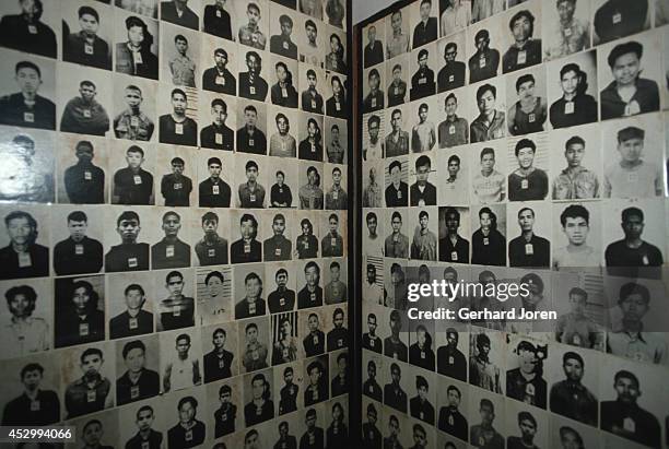 Some of over 6,000 photographs at Toul Sleng Museum in Phnom Penh. The Khmer Rouge carefully transcribed the prisoners' interrogations, photographed...