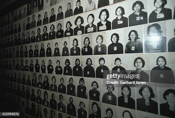 Some of over 6,000 photographs at Toul Sleng Museum in Phnom Penh. The Khmer Rouge carefully transcribed the prisoners' interrogations, photographed...