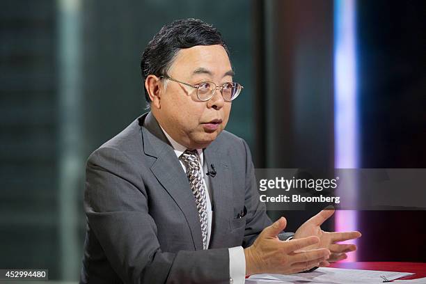 Ronnie Chan, chairman of Hang Lung Properties Ltd., gestures while he speaks during a Bloomberg Television interview in Hong Kong, China, on Friday,...