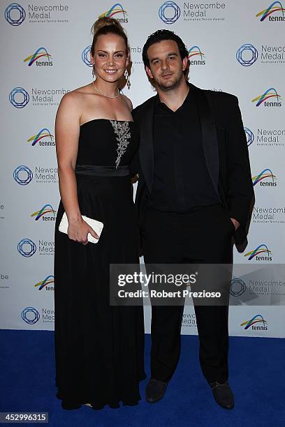 Jelena Dokic and Tin Bikic arrive prior to the 2013 Newcombe Medal at Crown Palladium on December 2, 2013 in Melbourne, Australia.