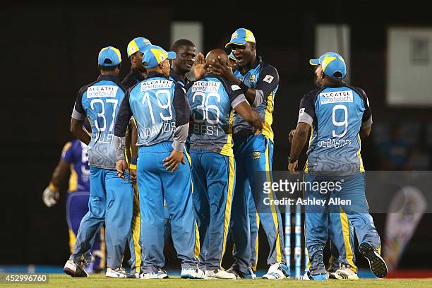 St Lucia Zouks celebrate the wicket of Dwayne Smith during a match between St. Lucia Zouks and Barbados Tridents as part of week 4 of the Limacol...