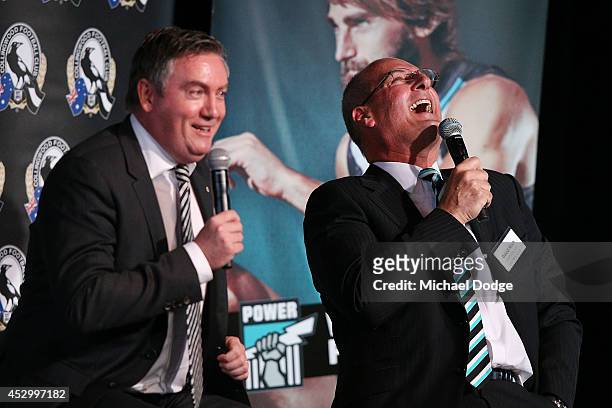 Collingwood Magpies President Eddie McGuire and Port Adelaide President David Koch react when speaking at The Importance of Leadership Business...
