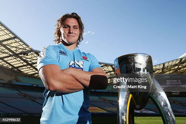 Waratahs captain Michael Hooper poses with the Super Rugby trophy during the Super Rugby media opportunity at ANZ Stadium on August 1, 2014 ahead of...