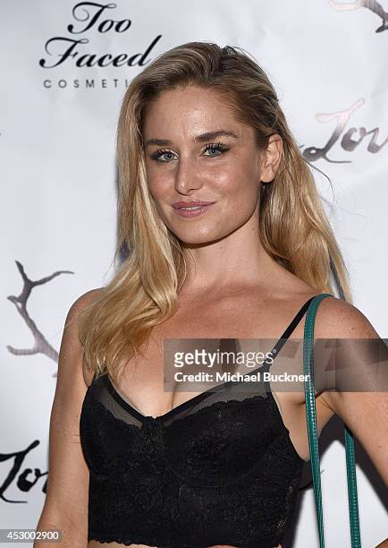 Actress Christina Collard attends For Love and Lemons annual SKIVVIES party co-hosted by Too Faced and performance by The Shoe at The Carondelet...