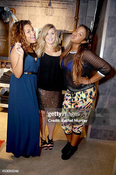 Models Amber Jones, Michaela McGrady, and Seymone CF in City Chic attend the City Chic Exclusive Preview: First U.S Store Culver City at Westfield...