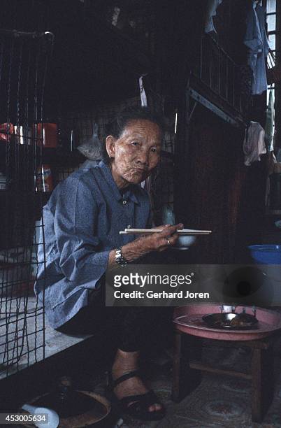 This 84-year old woman lives in a cage bed in a crowded apartment in Mong Kok district in Hong Kong. She pays US$ 40 a month for two square meters,...
