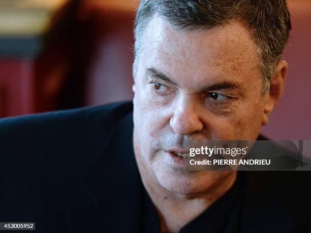 Israeli film director Amos Gitai poses during an interview in Paris on July 29 a week before the release in France of his upcoming film "Ana Arabia"....
