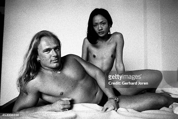 Roger a German sex tourist with a 19 year old katoey prostitute in his hotel room in Pattaya. The katoey has not yet had a sex change, because the...