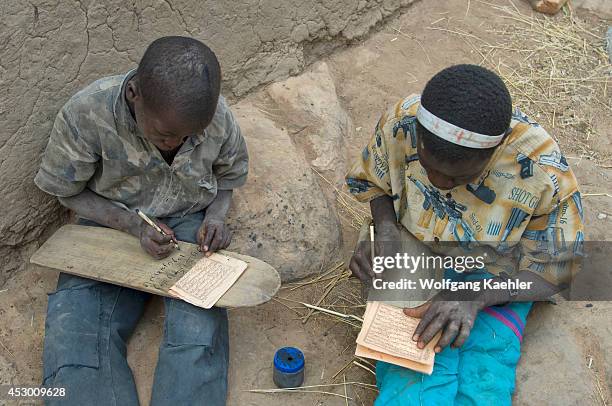 Mali, Near Bandiagara, Dogon Country, Niogono Dogon Village, Boys Writing On Wooden Tablets, Koran School.