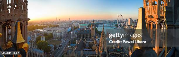 Panoramic view From Victoria Tower on Houses of Parliament and London skyline at sunset.