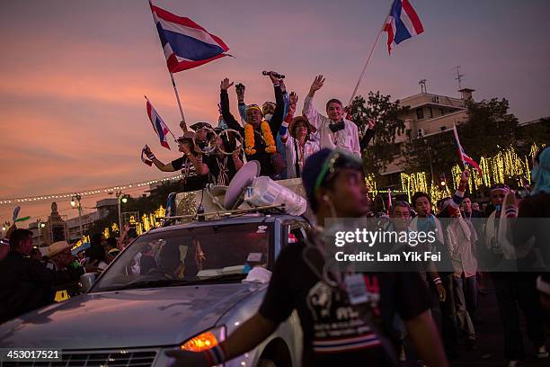 Anti-government protesters rally at Democracy Monument on December 2, 2013 in Bangkok, Thailand. Anti-government protesters in Bangkok say they plan...