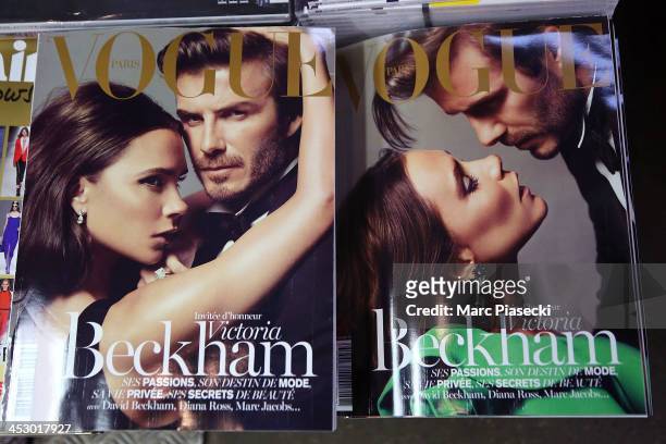 Close-up on the two Vogue magazine 'Victoria and David Beckham' French covers for the latest issue of the magazine which are displayed for sale on...