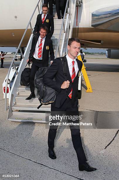 Jonny Evans of Manchester United arrives in Detroit as part of their pre-season tour of the United States on July 31, 2014 in Detroit, Michigan.
