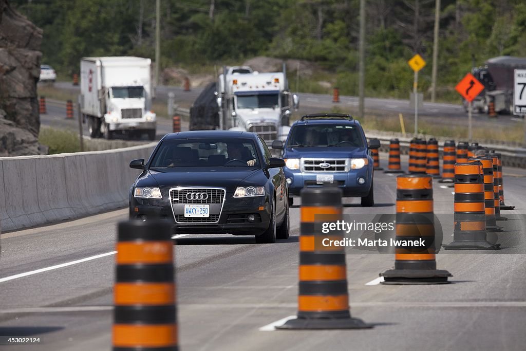 Construction workers at the Gull Lake Narrows bridge which is soon to be open