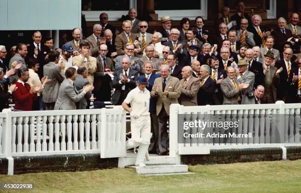 England and Yorkshire batsman Geoff Boycott makes his way through the MCC members on his way to opening the batting on his 100th Test match during...