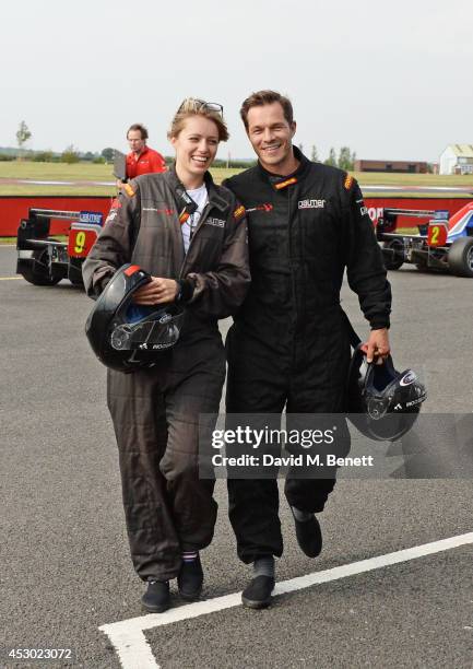 Federica Amati and Paul Sculfor attend the Stride Foundation track day in aid of The Amy Winehouse Foundation at the Bedford Autodrome on August 1,...