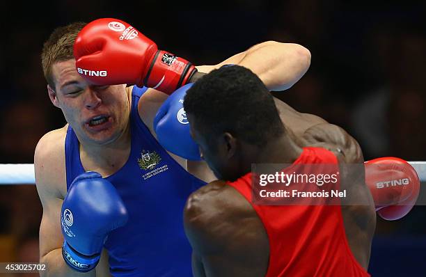 Efe Ajagba of Nigeria competes with Joseph Goodall of Australia during the Men's Super heavy +91 kg Semi-Finals Boxing at Scottish Exhibition And...