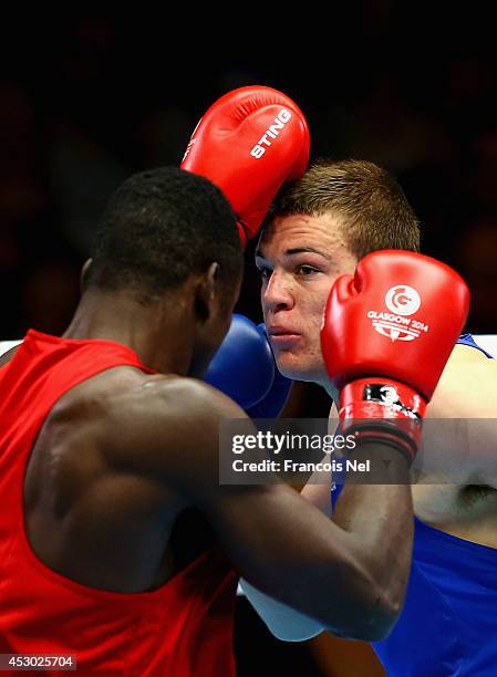 Efe Ajagba of Nigeria competes with Joseph Goodall of Australia during the Men's Super heavy +91 kg Semi-Finals Boxing at Scottish Exhibition And...