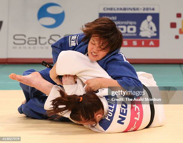 Kim Polling of Netherland and Chizuru Arai of Japan compete in the women's -70kg final match during day two of the Judo Grand Slam at the on November...