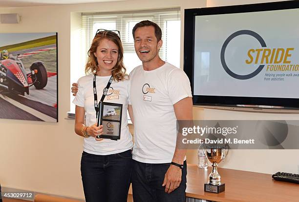 Federica Amati and Paul Sculfor attend the Stride Foundation track day in aid of The Amy Winehouse Foundation at the Bedford Autodrome on August 1,...