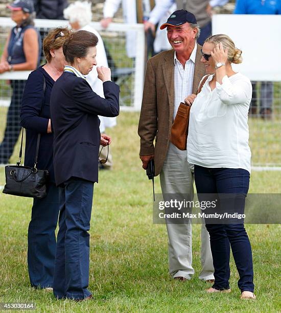 Zara Phillips looks on as her mother Princess Anne, The Princess Royal and father Mark Phillips share a joke during day 1 of the Festival of British...