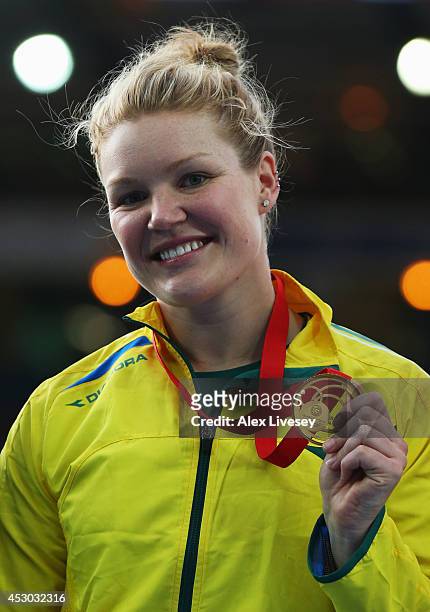 Gold medallist Dani Samuels of Australia poses on the podium during the medal ceremony for the Womens Discus Throw at Hampden Park during day nine...