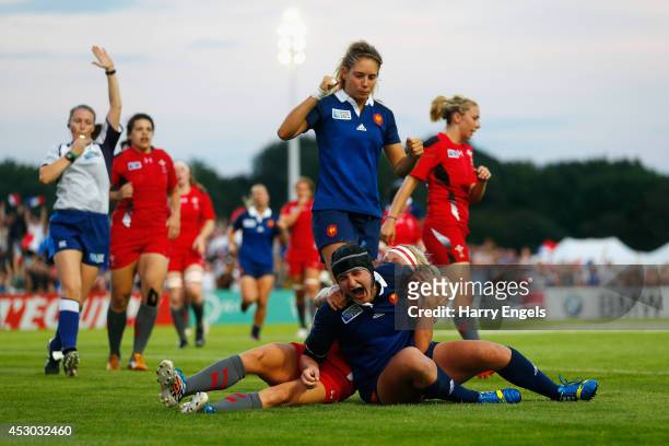 Shannon Izar of France celebrates scoring her side's second try during the IRB Women's Rugby World Cup Pool C match between France and Wales at the...