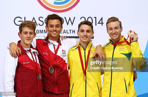Silver medalists Tom Daley and James Denny of England pose with Gold medalists Domonic Bedggood and Matthew Mitcham of Australia during the medal...