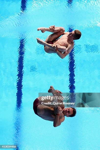 Tom Daley and Denny James of England compete in the Men's Synchronised 10m Platform Final at Royal Commonwealth Pool during day nine of the Glasgow...