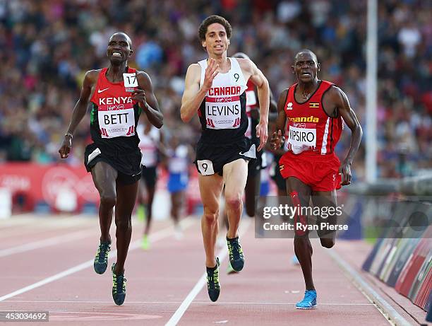 Moses Kipsiro of Uganda sprint to the line to win gold ahead of Silver medalist Josphat Kipkoech Bett of Kenya and Bronze medalist Cameron Levins in...