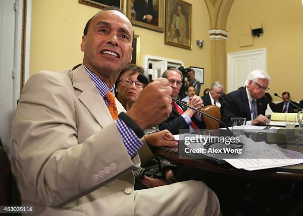 Rep. Luis Gutierrez speaks as Rep. Nita Lowey , and Rep. Hal Rogers and Rep. Bob Goodlatte listen duirng a House Rules Committee meeting August 1,...