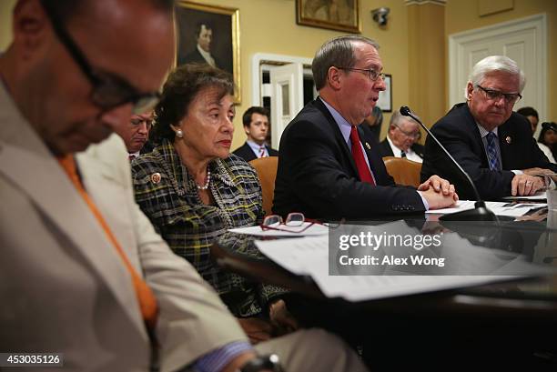 Rep. Bob Goodlatte speaks as Rep. Luis Gutierrez , Rep. Nita Lowey , and Rep. Hal Rogers listen duirng a House Rules Committee meeting August 1, 2014...