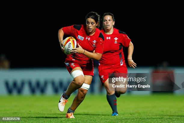 Sioned Harries of Wales runs upfield during the IRB Women's Rugby World Cup Pool C match between France and Wales at the French Rugby Federation...