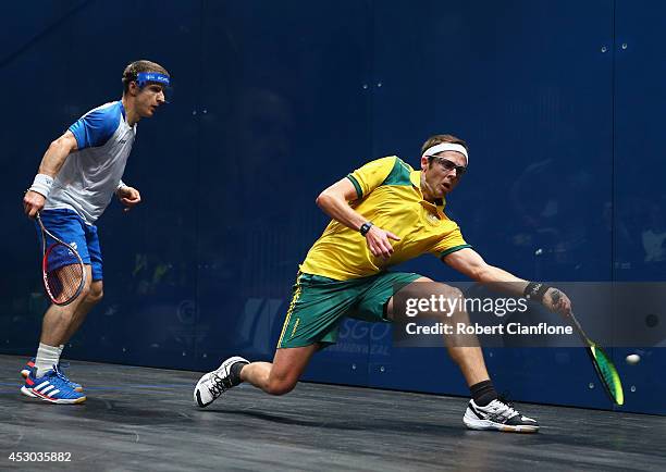 Matthew Karwalski of Australia plays a shot during the men's doubles quarterfinal match againsts Harry Leitch and Alan Clyne of Scotland at Scotstoun...