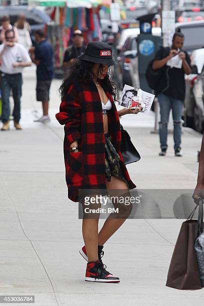 Rihanna is seen leaving her hotel for the airport August 1, 2014 in New York City.