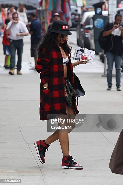 Rihanna is seen leaving her hotel for the airport August 1, 2014 in New York City.