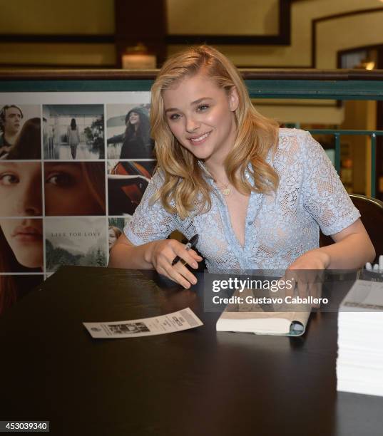 Chloe Moretz signs copies of the book ''If I Stay'' at Barnes& Noble on August 1, 2014 in Miami, Florida.