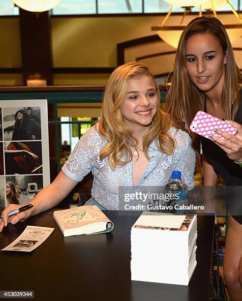 Chloe Moretz signs copies of the book ''If I Stay'' at Barnes& Noble on August 1, 2014 in Miami, Florida.