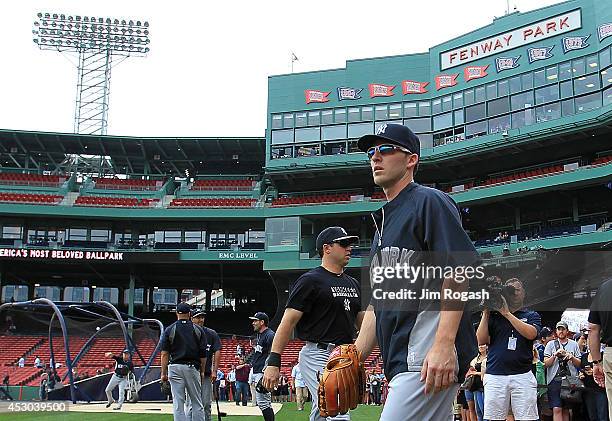 Stephen Drew of the New York Yankees walks onto the field before a game with the Boston Red Sox at Fenway Park on August 1, 2014 in Boston,...