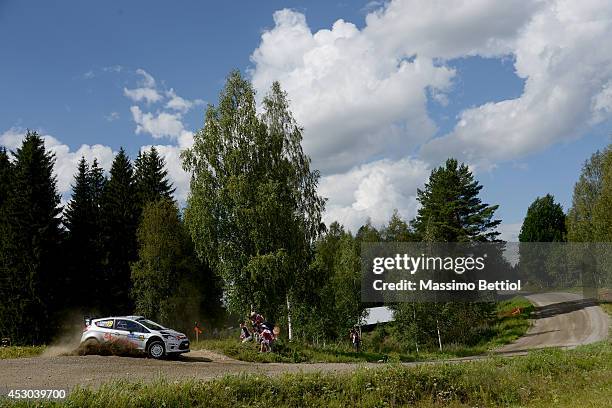 Henning Solberg of Norway and Ilka Minor of Austrian compete in their Ford Fiesta RS WRC during Day One of the WRC Finland on August 1, 2014 in...